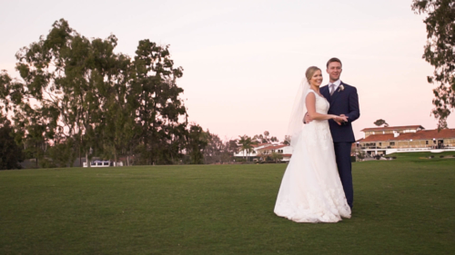 Bride and groom on golf course at Lomas Santa Fe Country Club under tree.