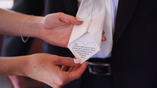 Wedding bride makes customized tie with message for dad