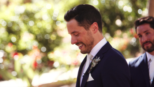 Mt. Woodson Castle Wedding happy groom reads his vows