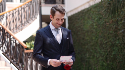 Groom get emotional while reading heartfelt card from bride