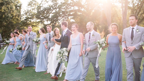 Wedding party walk together in a line at Brookview Ranch Malibu