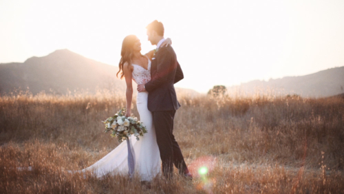 Bride and groom dancing in field at Brookview Ranch Malibu