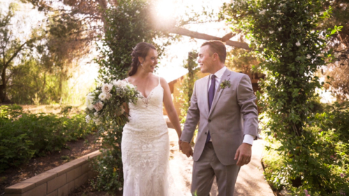 bride and groom walking at Ethereal Gardens