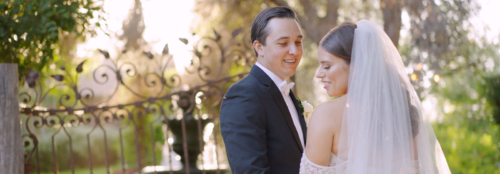 Ethereal Gardens Wedding Bride and Groom near gate