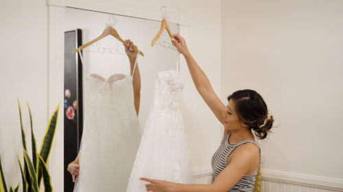 Bride checks out her dress at Botanica