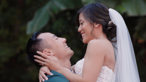 Groom picks up Bride